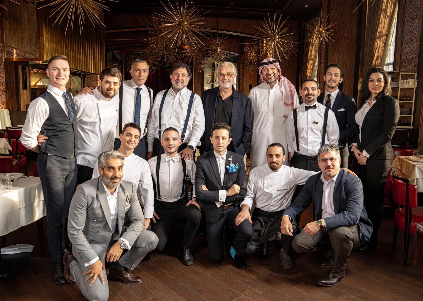 Flavio Briatore With the Managers of  .
Thank you and congratulations to the whole Team for thei...