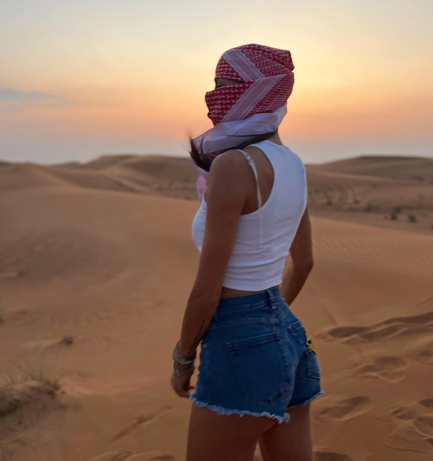 Elisabetta Gregoraci • Sun goes down in the desert...