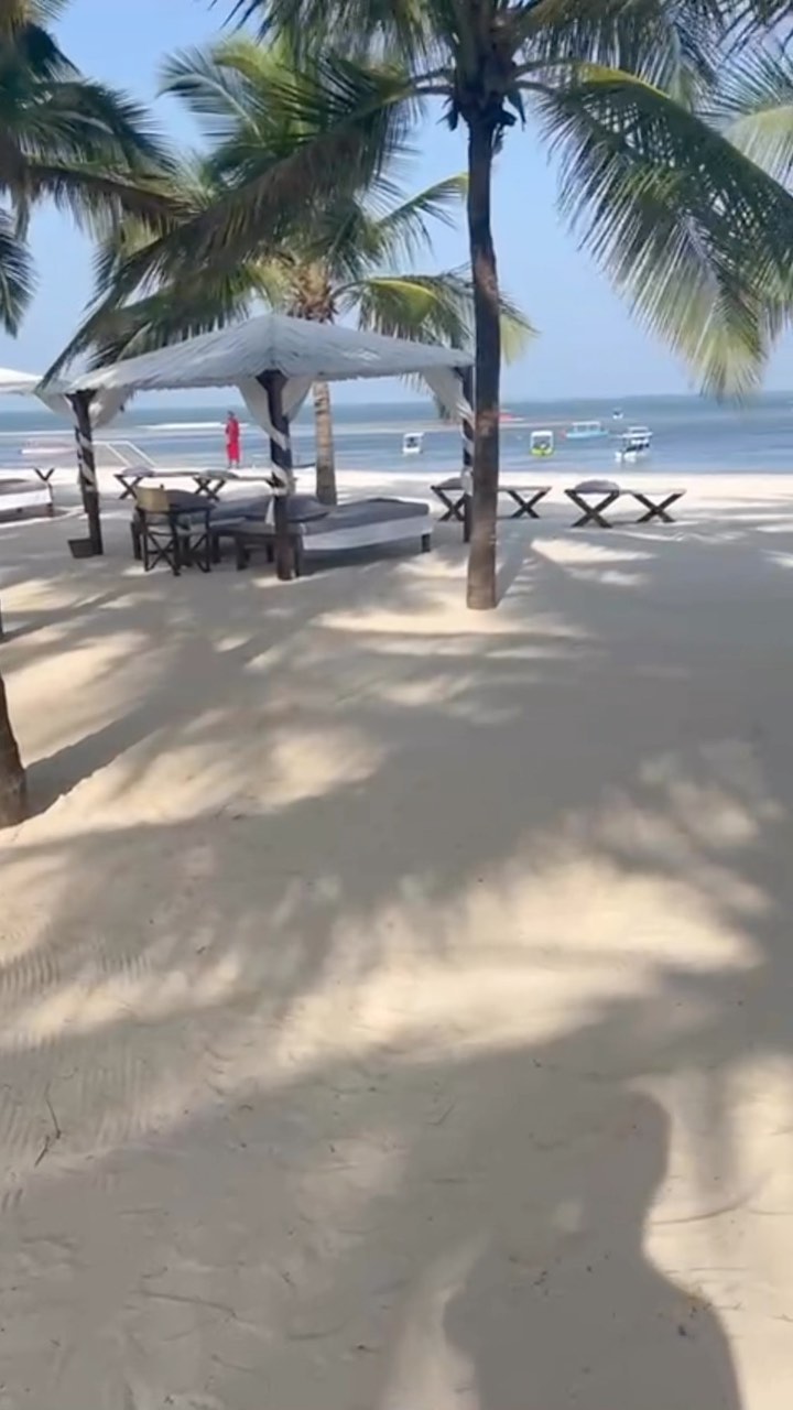 Flavio Briatore Walking on the beach at...