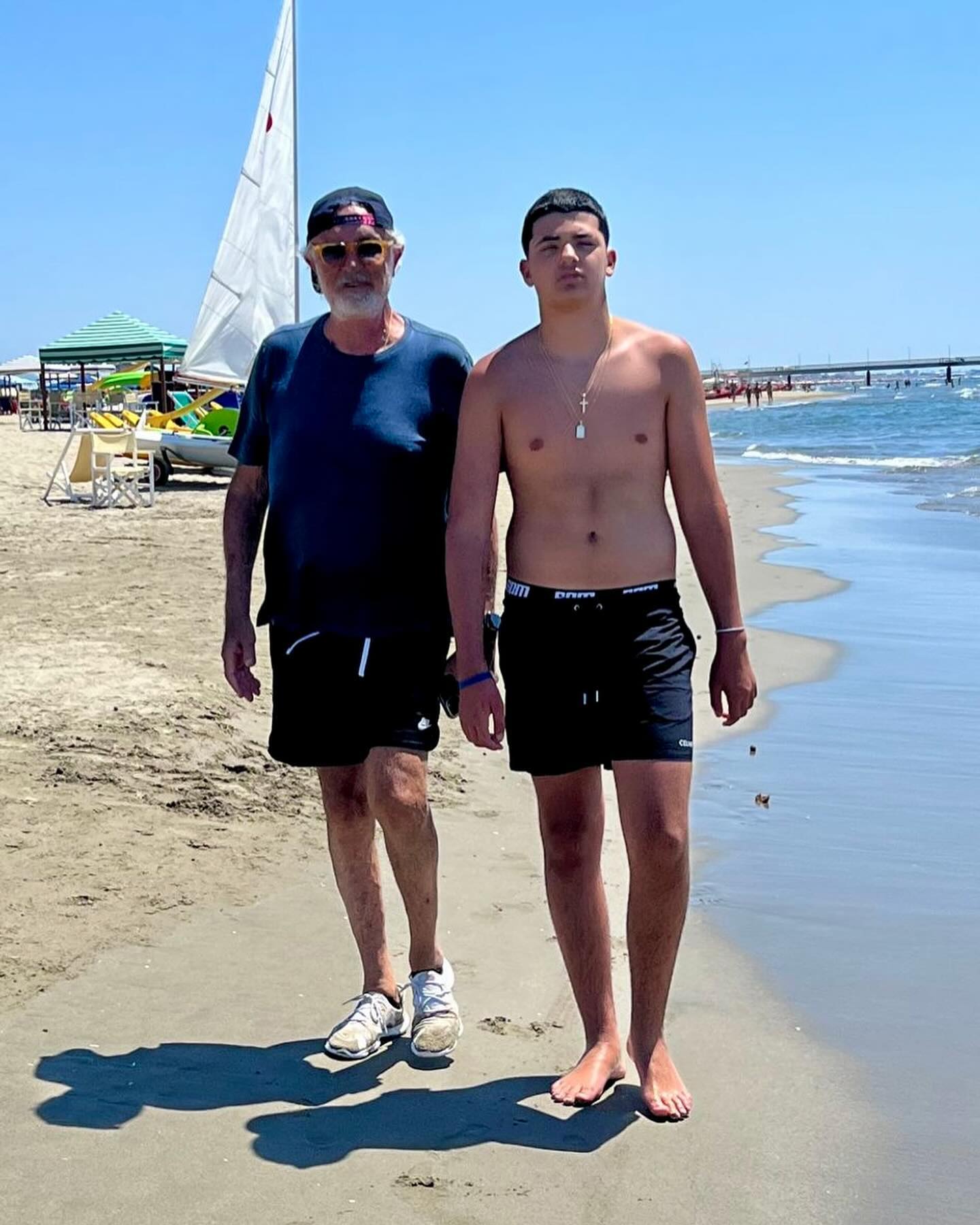 Flavio Briatore Sulla spiaggia di Marina di Pietrasanta con Falco...